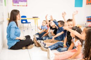 profile-view-group-preschool-students-raising-their-hands-trying-participate-school-min childcare seo agency